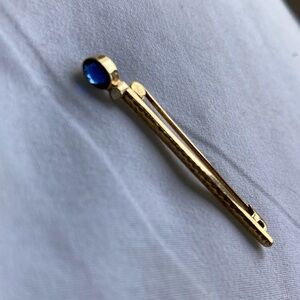 Gold Pin with Blue Gem